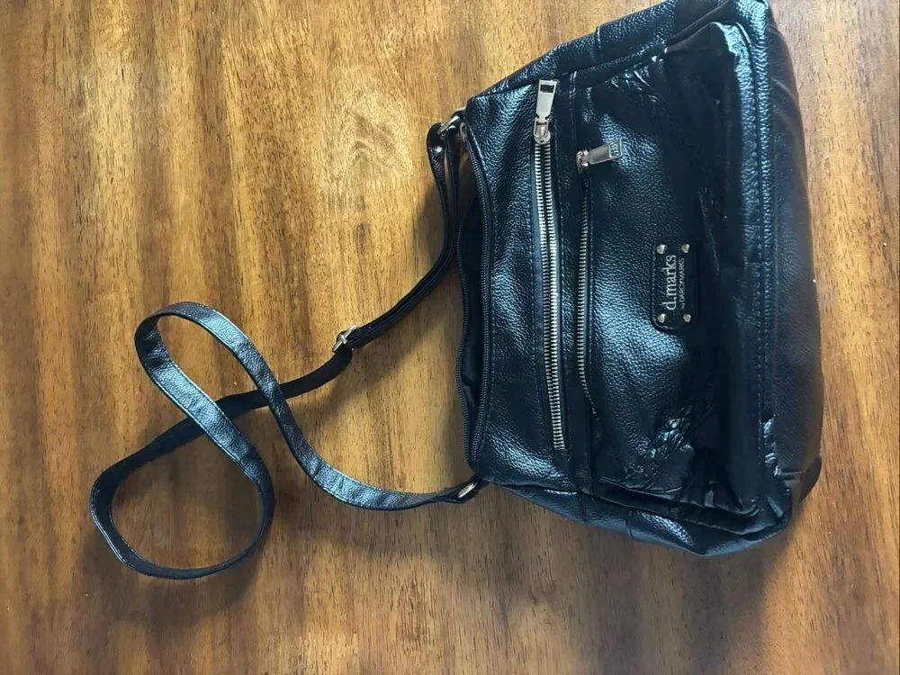 D. Marks women’s purse